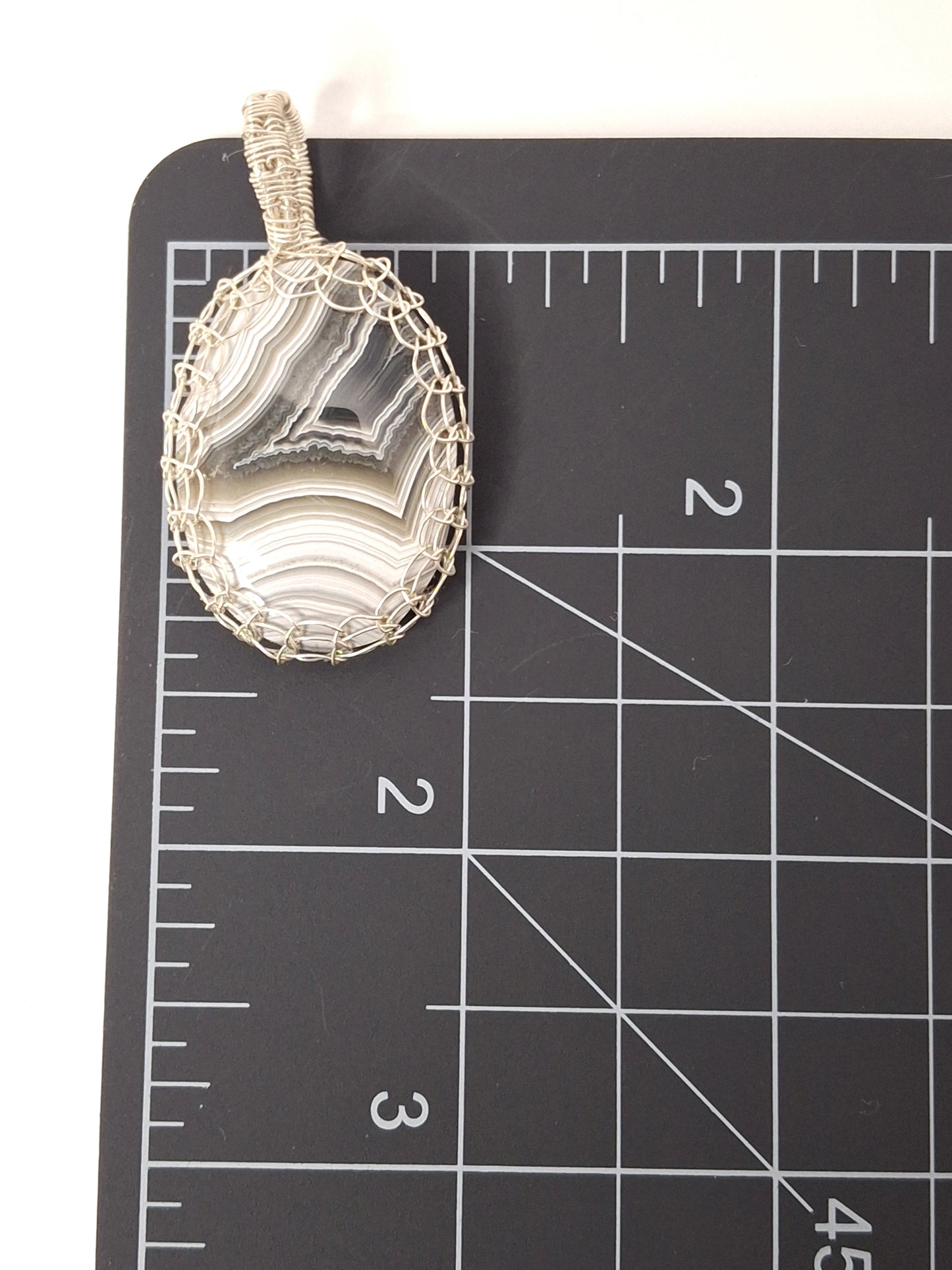 Handcrafted Wire-Wrapped & Polished Agate Pendants: Ancient Witness Stone