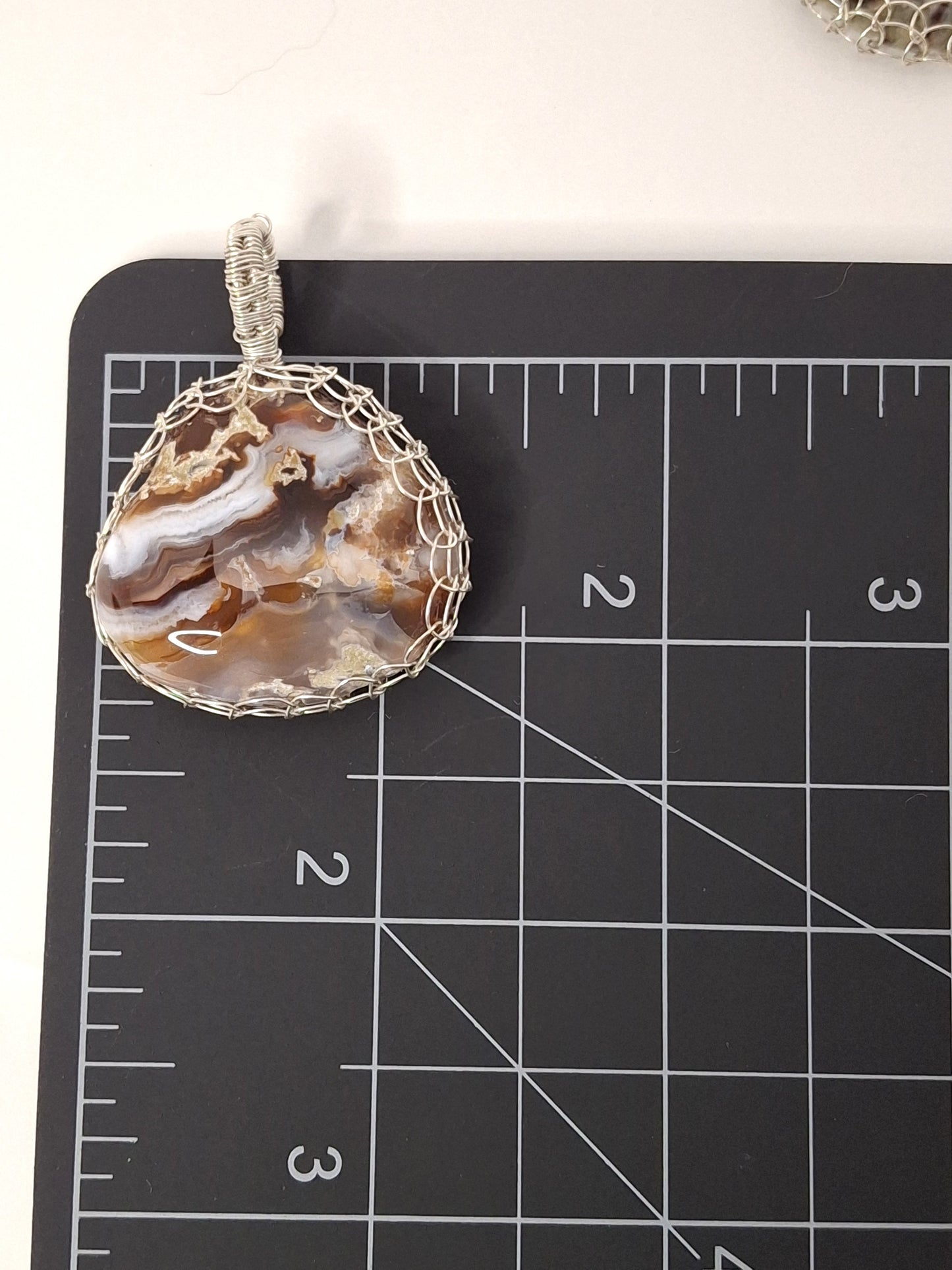 Handcrafted Wire-Wrapped & Polished Agate Pendants: Ancient Witness Stone