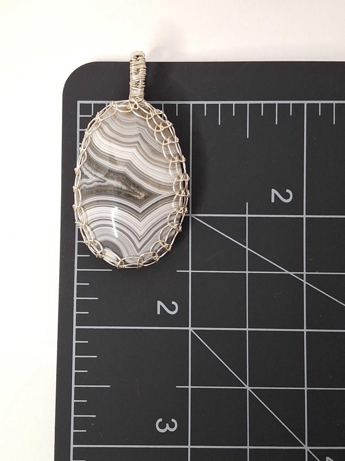 Handcrafted Wire-Wrapped & Polished Agate Pendants: Ancient Witness Stone