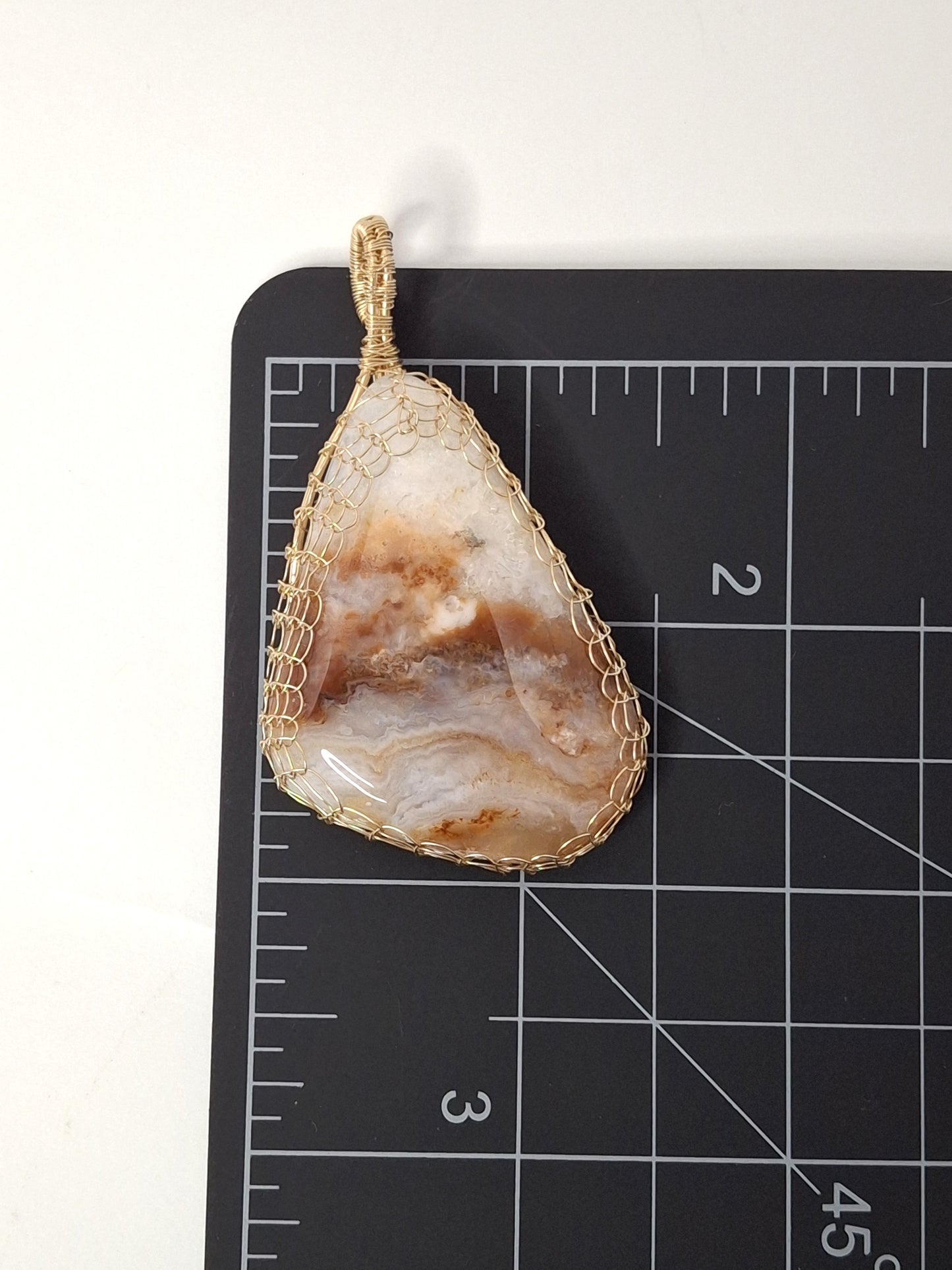 Handcrafted Wire-Wrapped & Polished Agate Pendants: Ancient Witness Stone